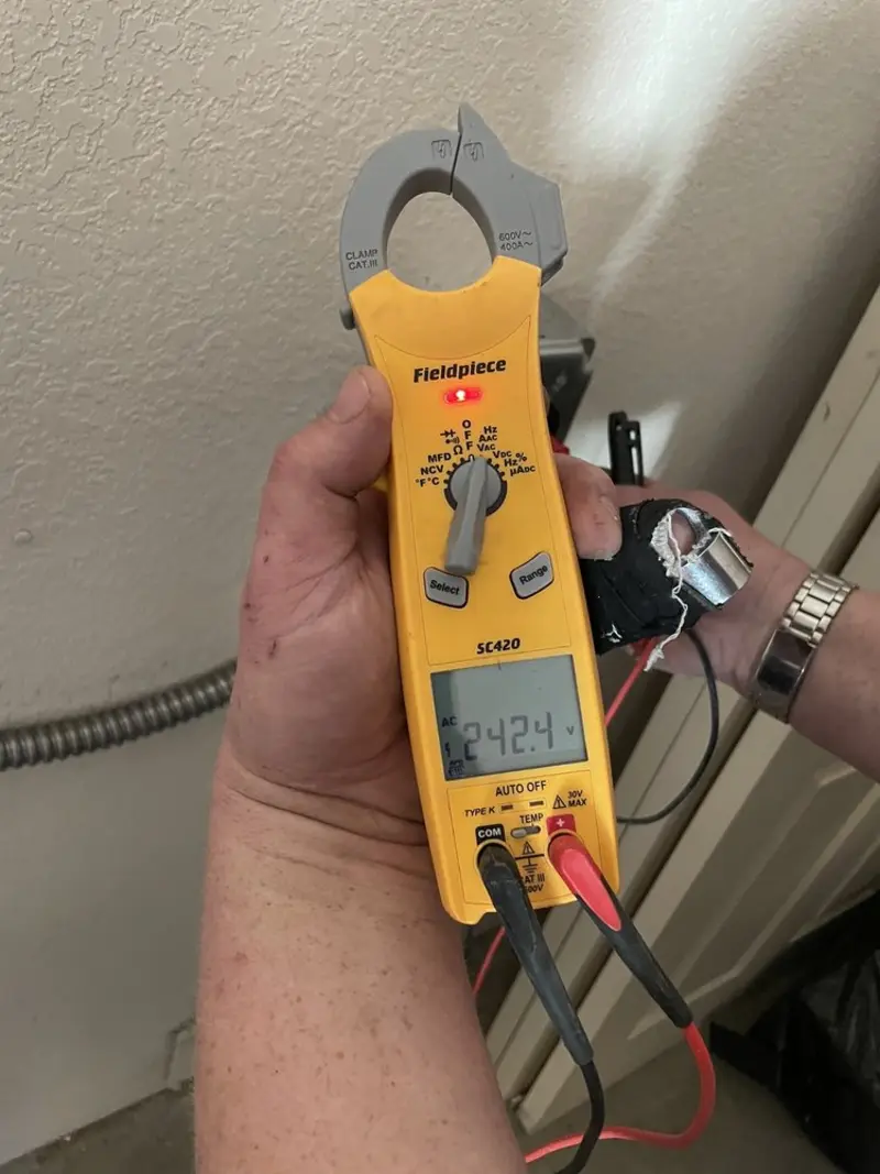Voltage testing with clamp meter during Hot Tub / Pool Electrical Wiring in Milford
